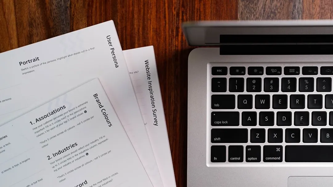 Generic printed resume and organization tools on an office desk