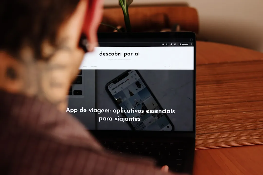 Smartphone and devices on a desk, suggesting a search for remote work opportunities.