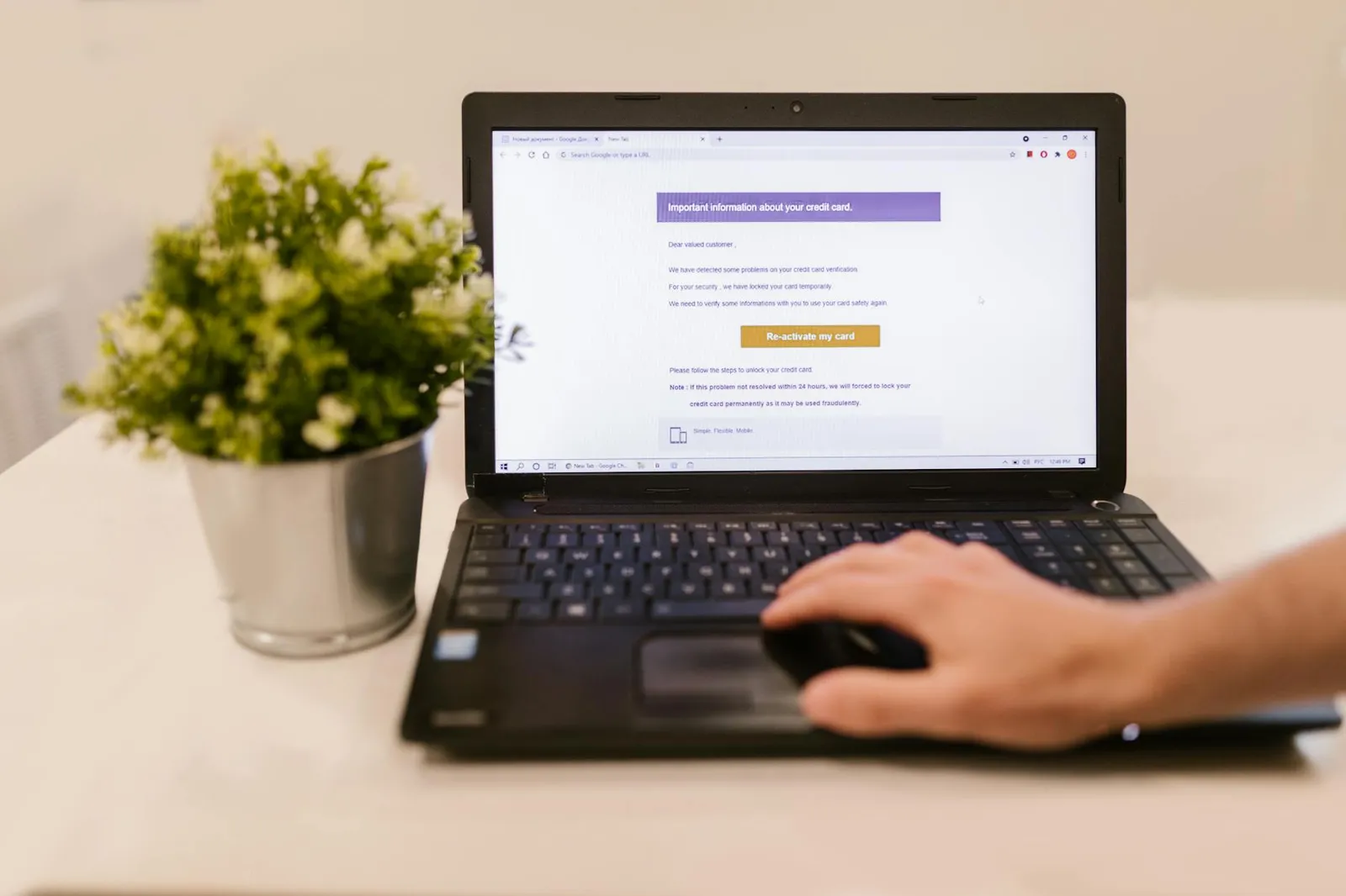 Hands typing on a notebook with generic icons and a sense of protection when sending data for job openings.